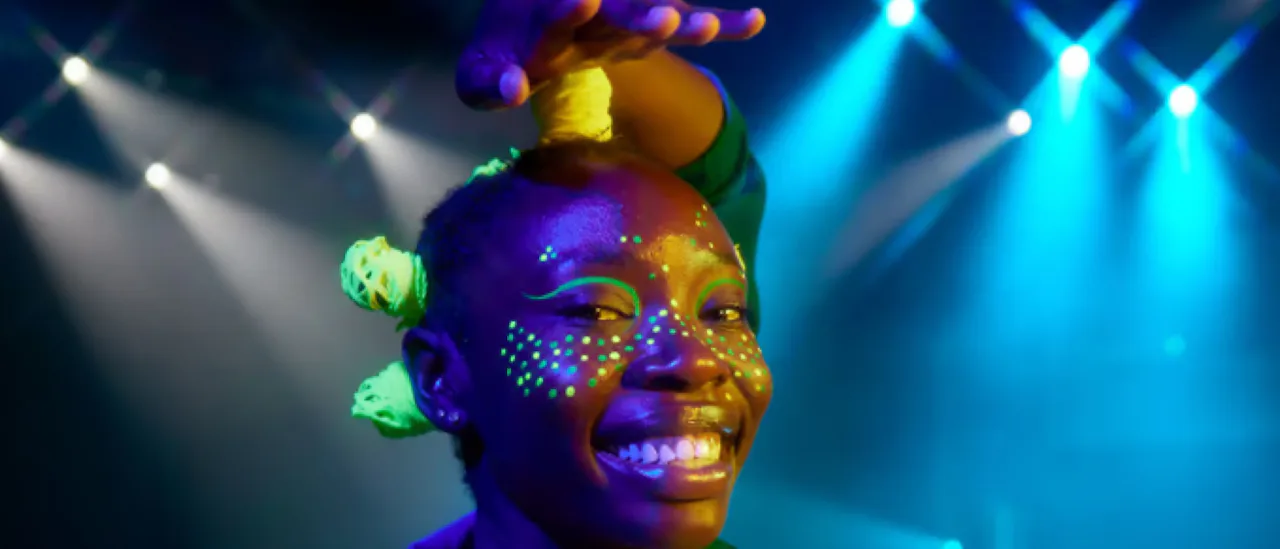Welcome to Scarlet Night - an unforgettable evening filled with pop-up circus acts, interactive games, karaoke, myth-telling, and live music!