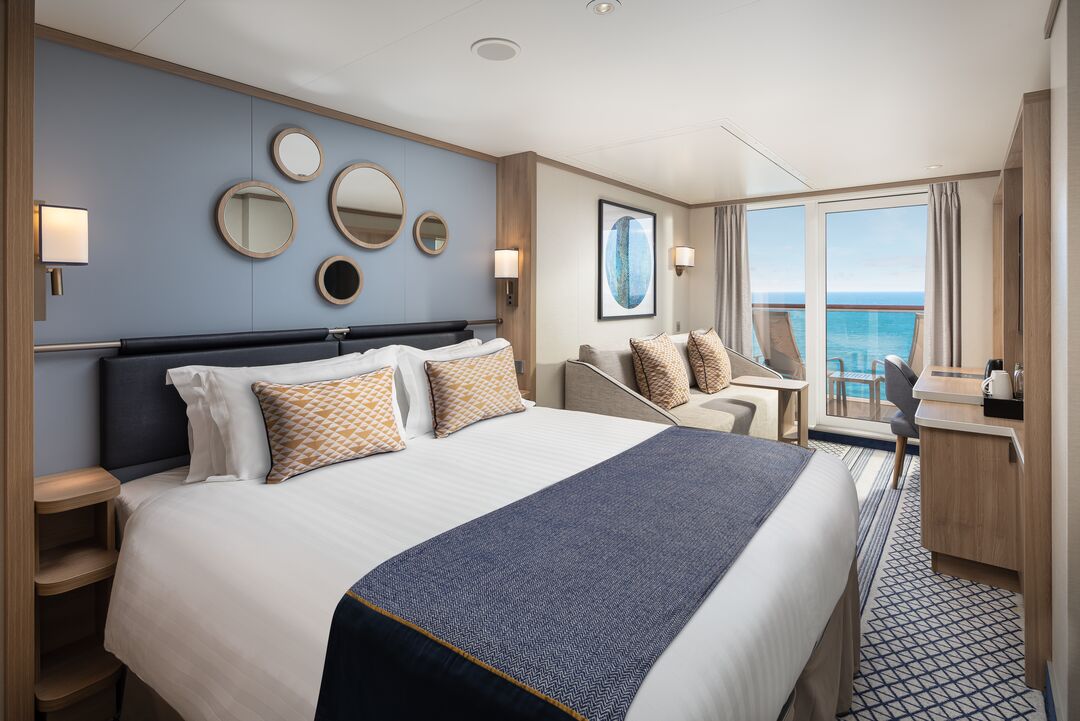 A bed in a Balcony Cabin onboard Iona, P&O Cruises ship