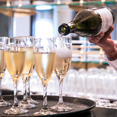 Champagne glasses on a tray - Ambassador