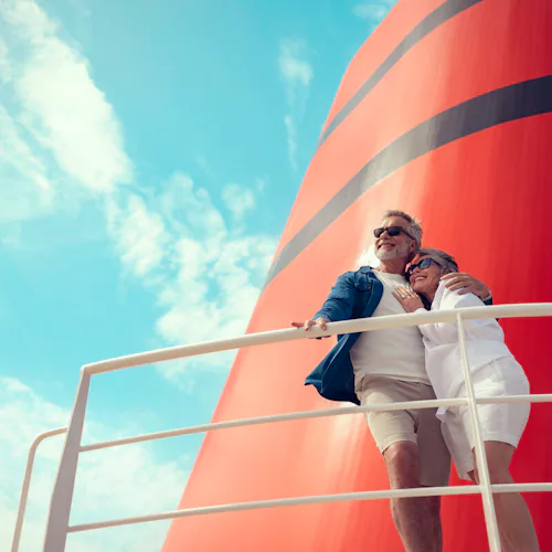 Couple on deck onboard a Queen Anne ship