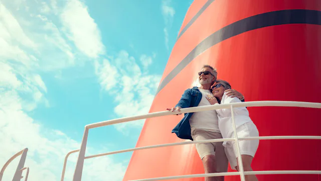 Couple on deck onboard a Queen Anne ship