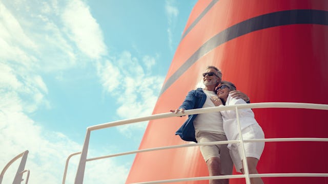 Couple on deck onboard a Queen Anne ship