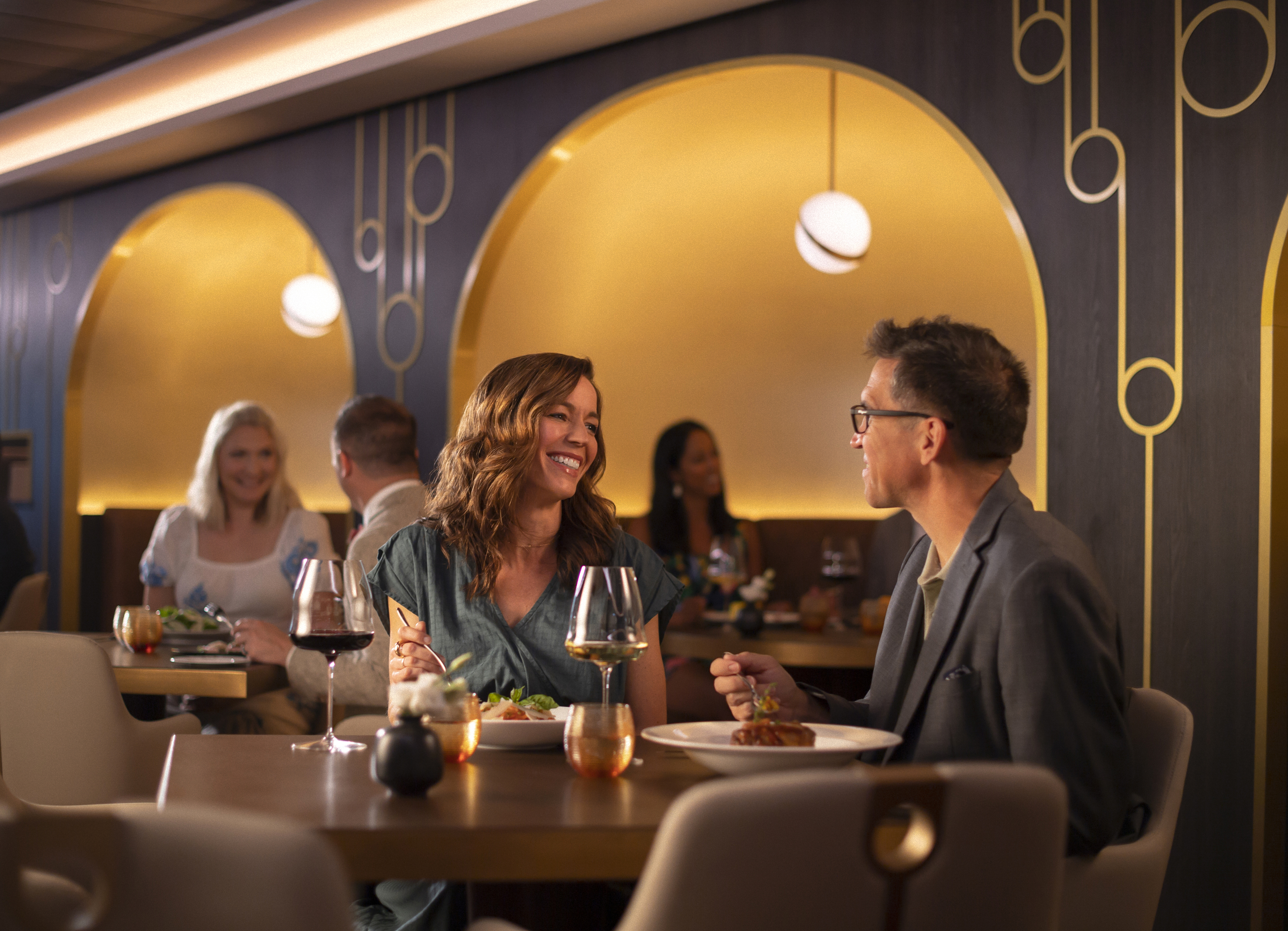 Guests dining at Palo Steakhouse, Disney Wish
