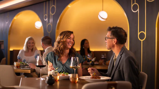 Guests dining at Palo Steakhouse, Disney Wish