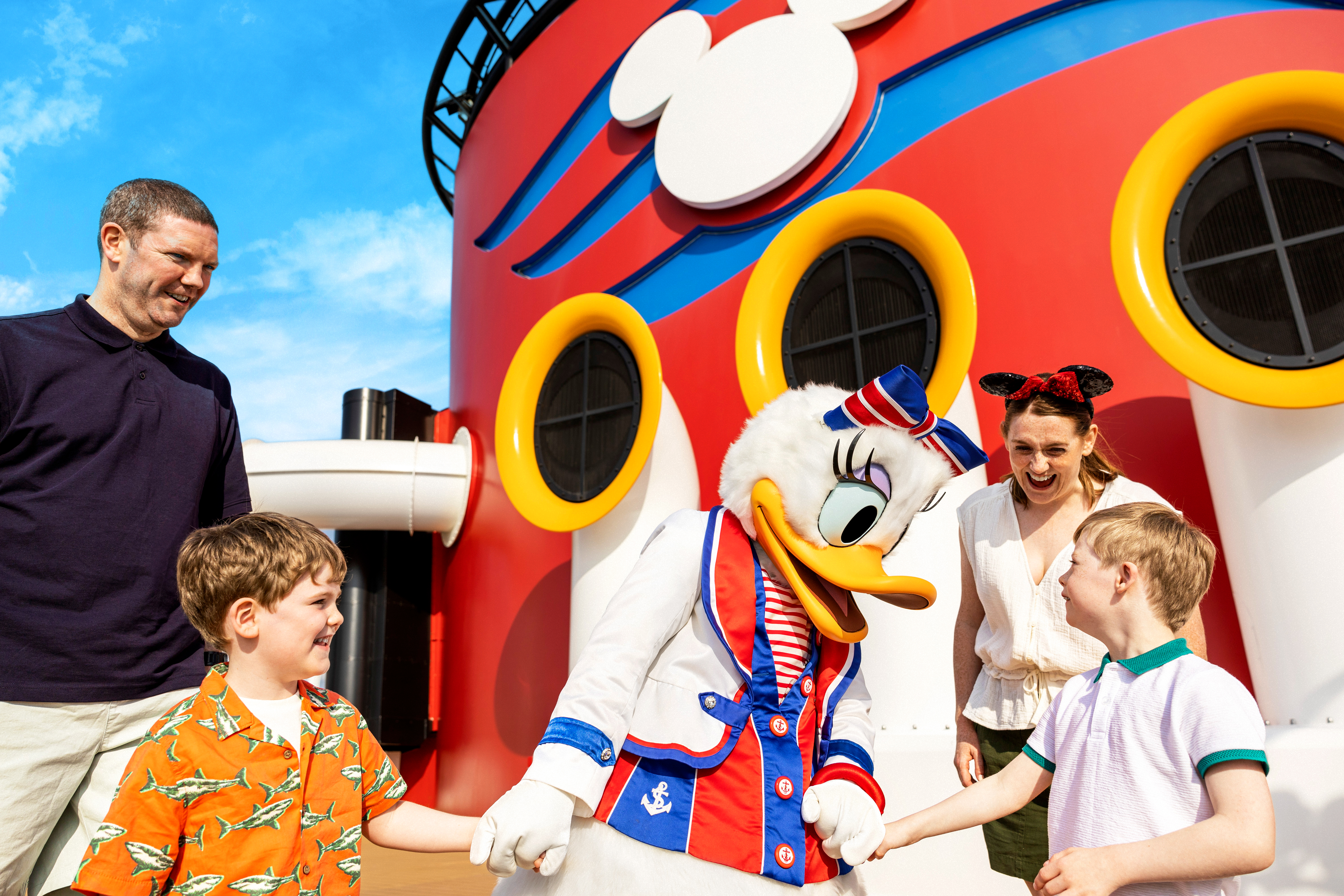 Family on Disney Ship with Daisy Duck