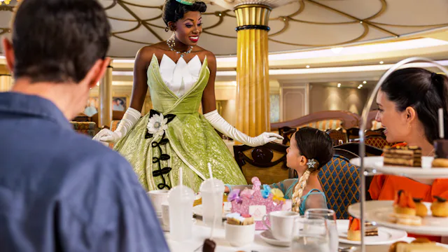 Princess Tiana with guests on Disney ship