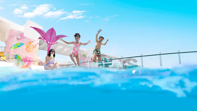 kids jumping in pool