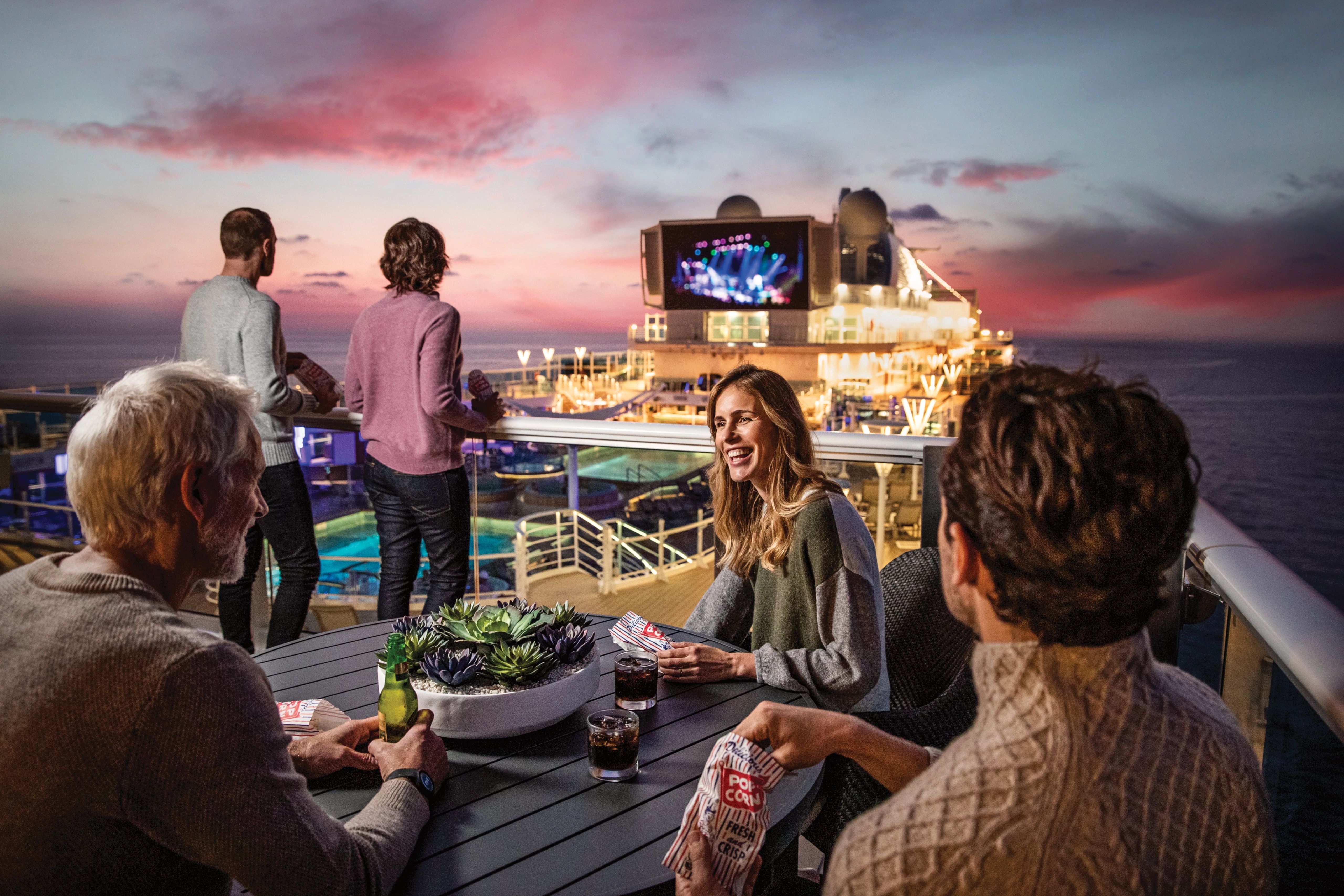 People watching movies under the stars on Princess