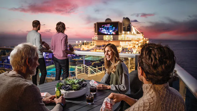 People watching movies under the stars on Princess