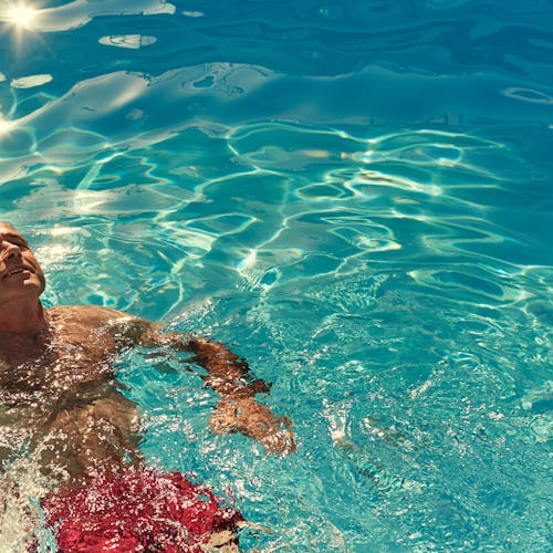 A guest relaxing in a pool on a P&O Cruises ship